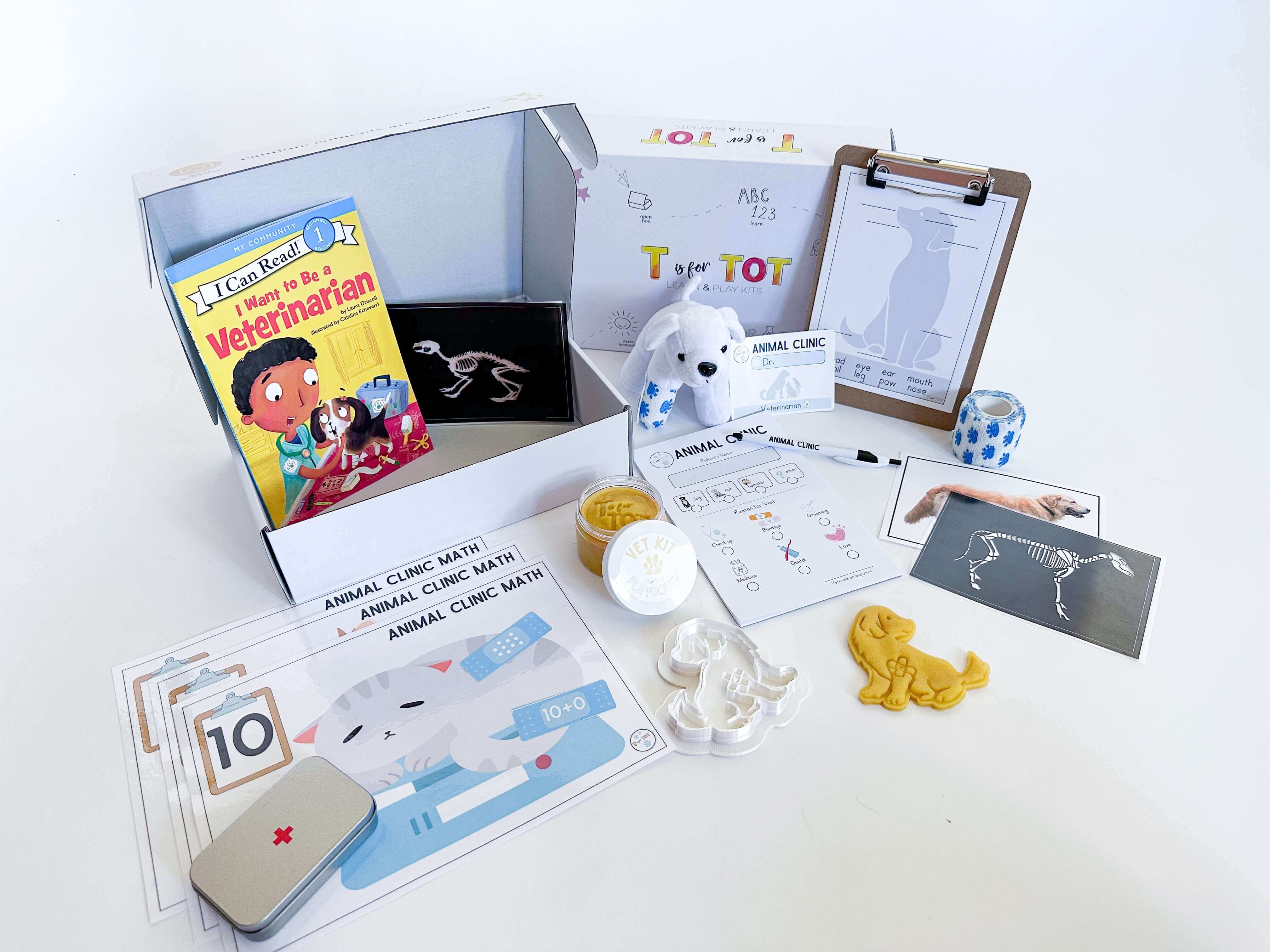 Learn and Play Kit featuring veterinary-themed toys, cards, and activities for kids in a monthly subscription box.